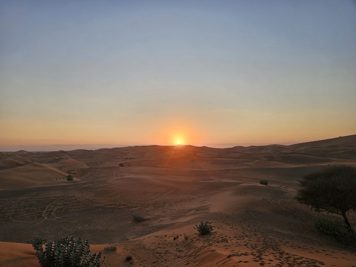 Sunset over the desert dunes near Dubai